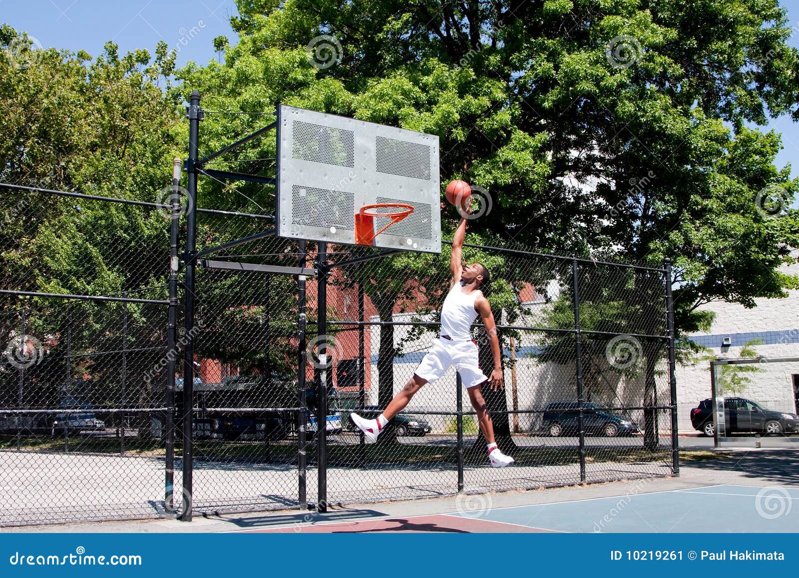 Jumping basketball player stock image. Image of basket 10219261