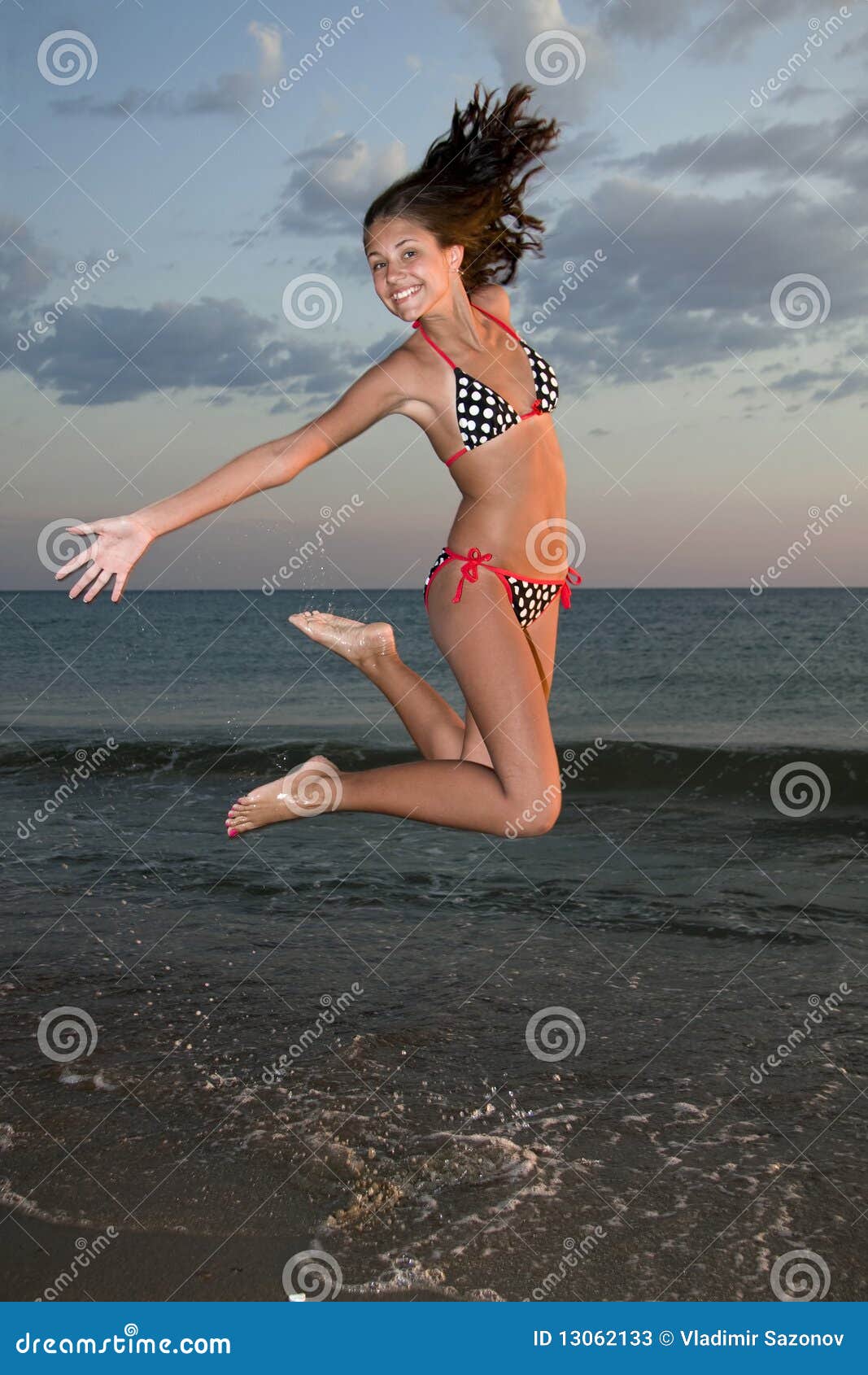 Jumping girl on the beach. I can fly.