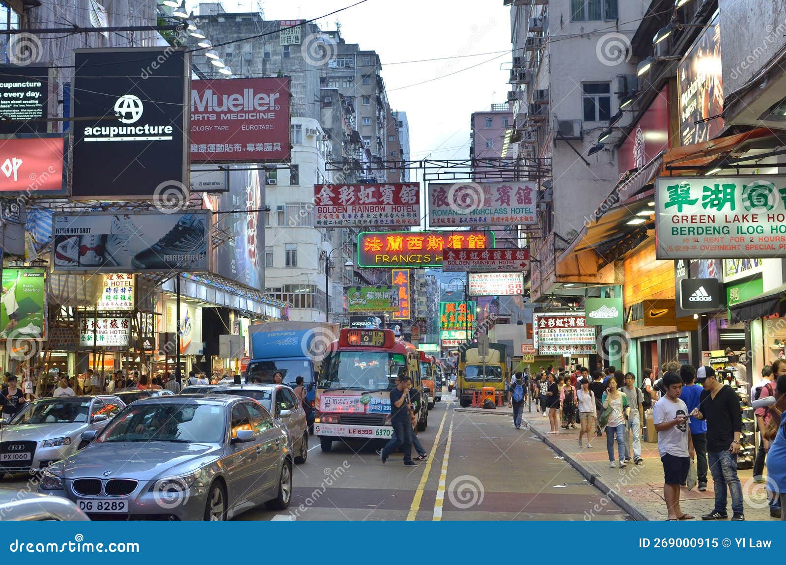 7 June 2013 Hong Kong Street Scene with Neon Signs at Night Editorial