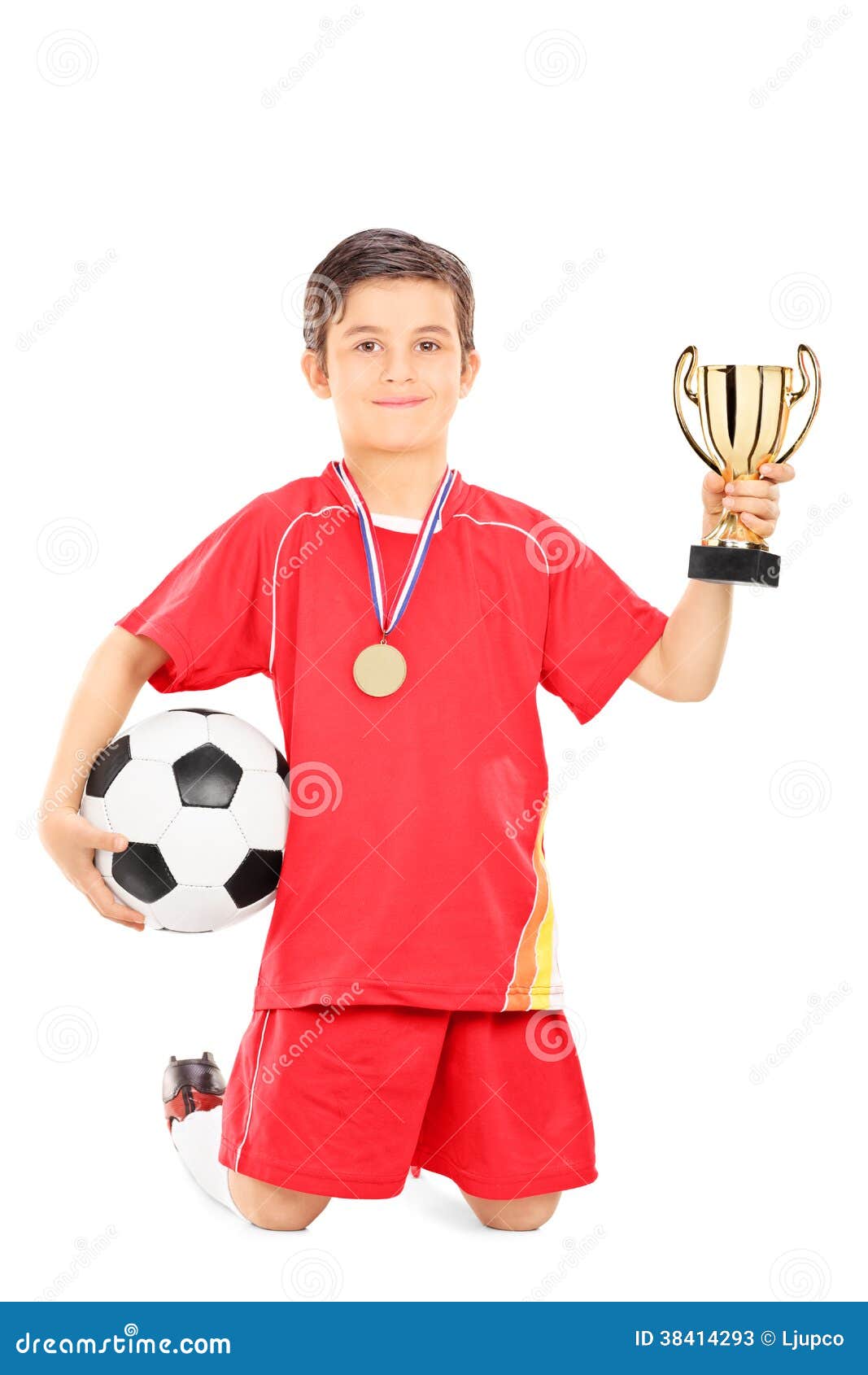 Junior Football Player Holding A Ball And Golden Cup Stock Image ...