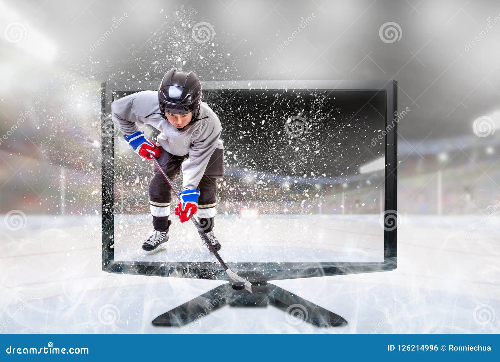 Junior Ice Hockey Player on Live 3D TV Inside Stadium Stock Photo