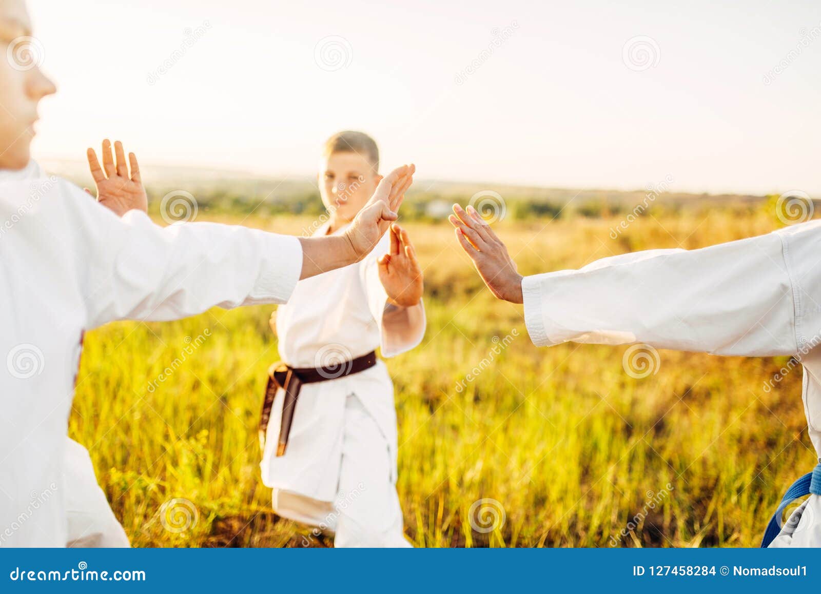 Junior Karate Team with Instructor on Training Stock Photo - Image of