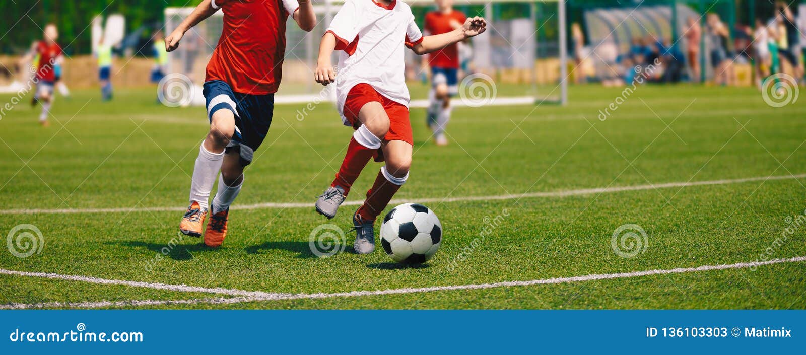 junior soccer match. football game for youth players