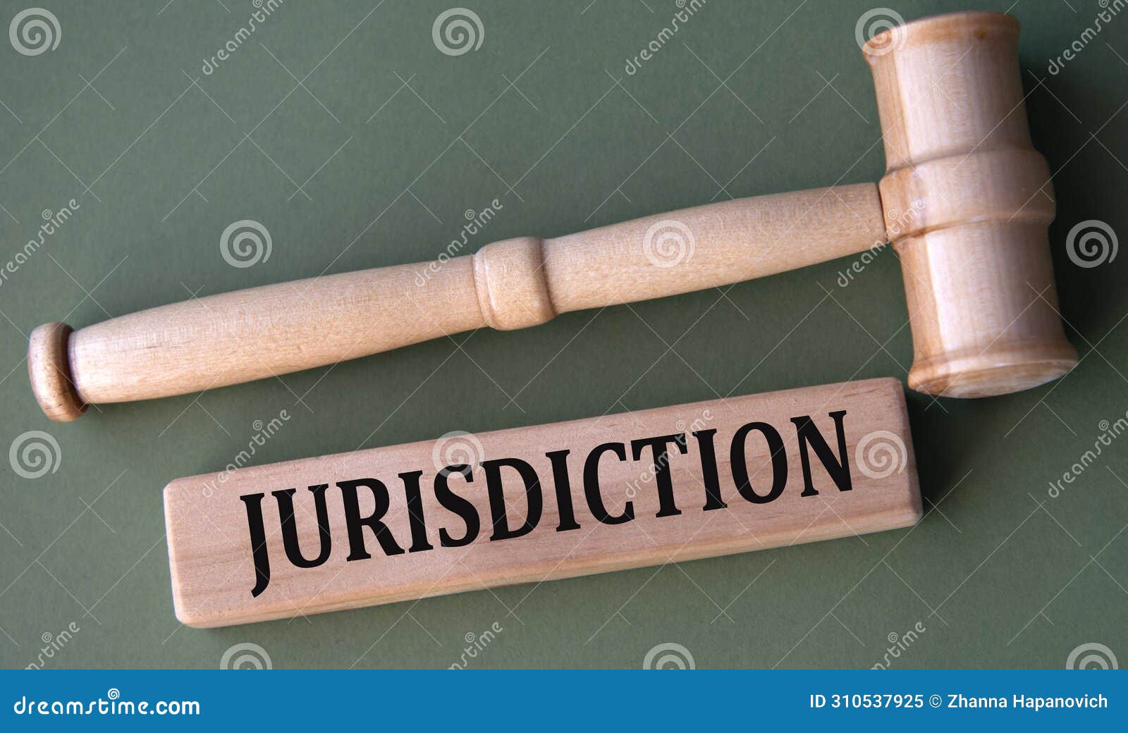 jurisdiction - word on wooden blocks on a white background with a judge's gavel