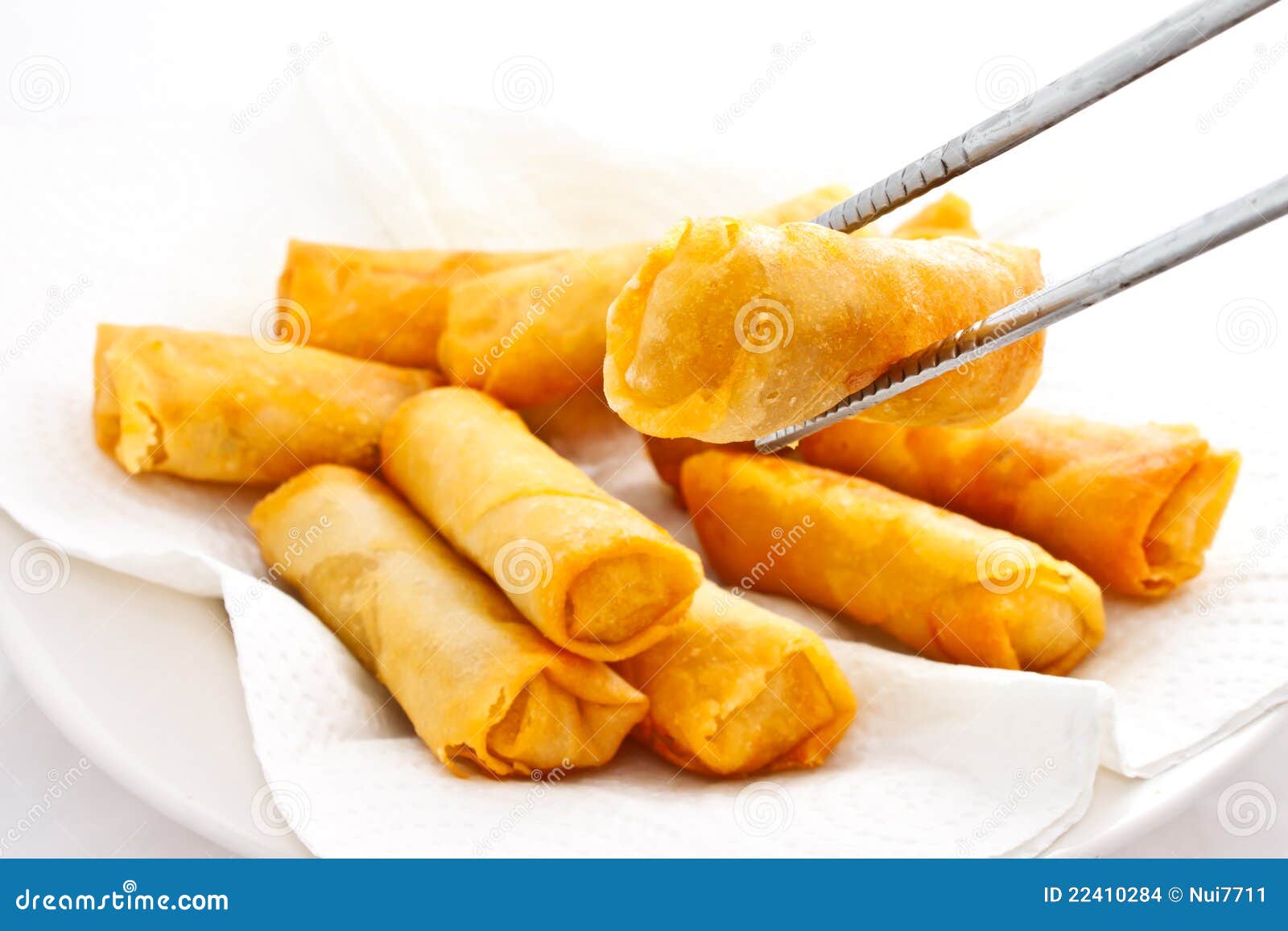 Just Finished Fried Springrolls With Chopsticks Stock Photo Image of dish, chopstick 22410284