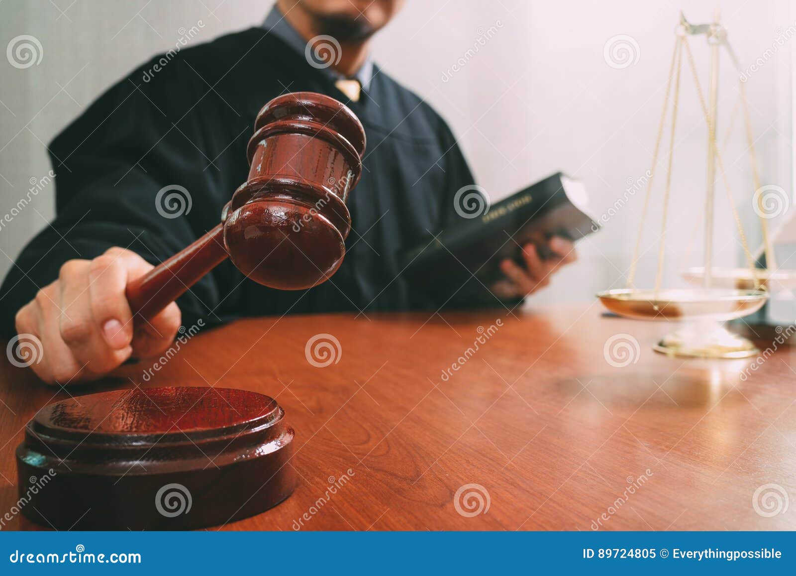 justice and law concept.male judge in a courtroom with the gavel