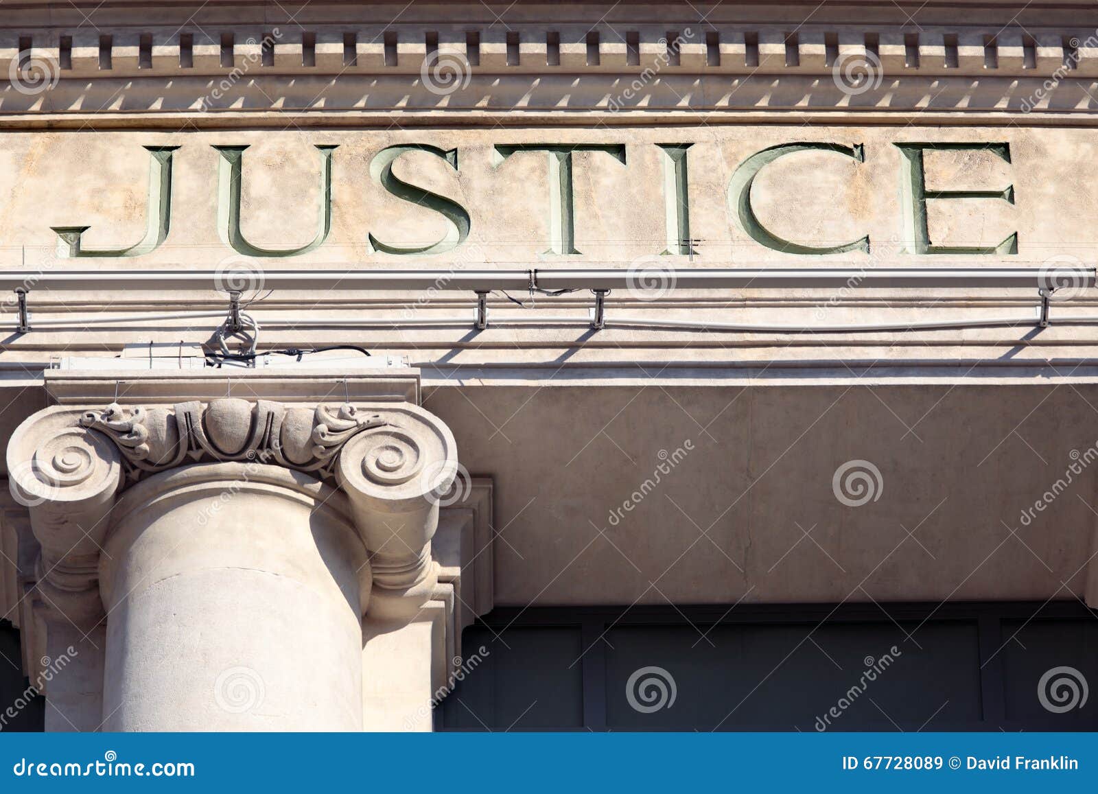 justice sign on a courtroom building, law courts