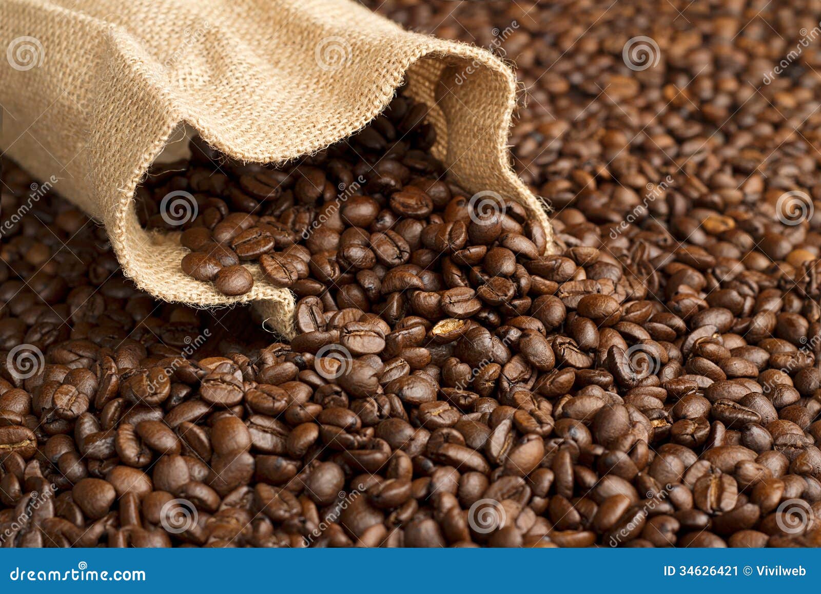 Jute bag on coffee beans stock image. Image of background 34626421