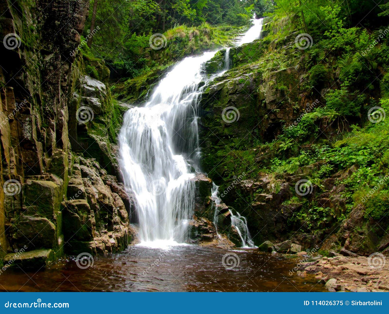 kamieÃâczyk`s waterfall located in poland, in sudetes mountains.
