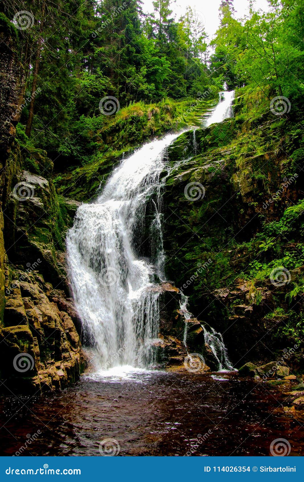 kamieÃâczyk`s waterfall located in poland, in sudetes mountains.