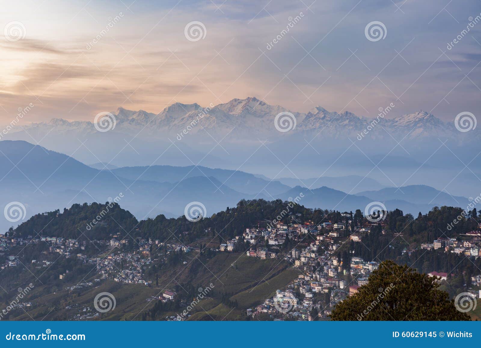 kanchenjunga range peak after sunset with darjeeling town