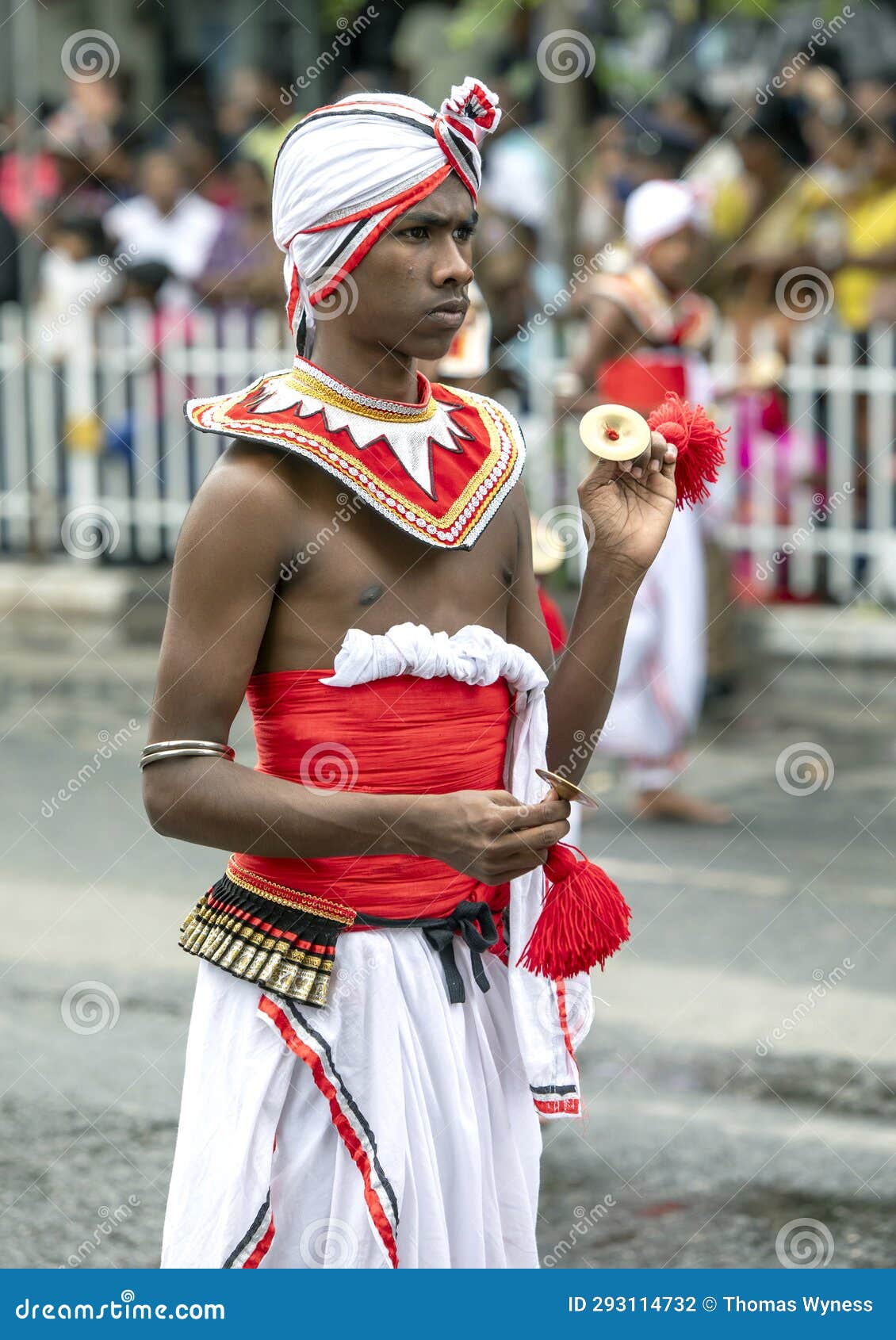 A Cymbal Player Performs Along a Road at Kandy in Sri Lanka during the