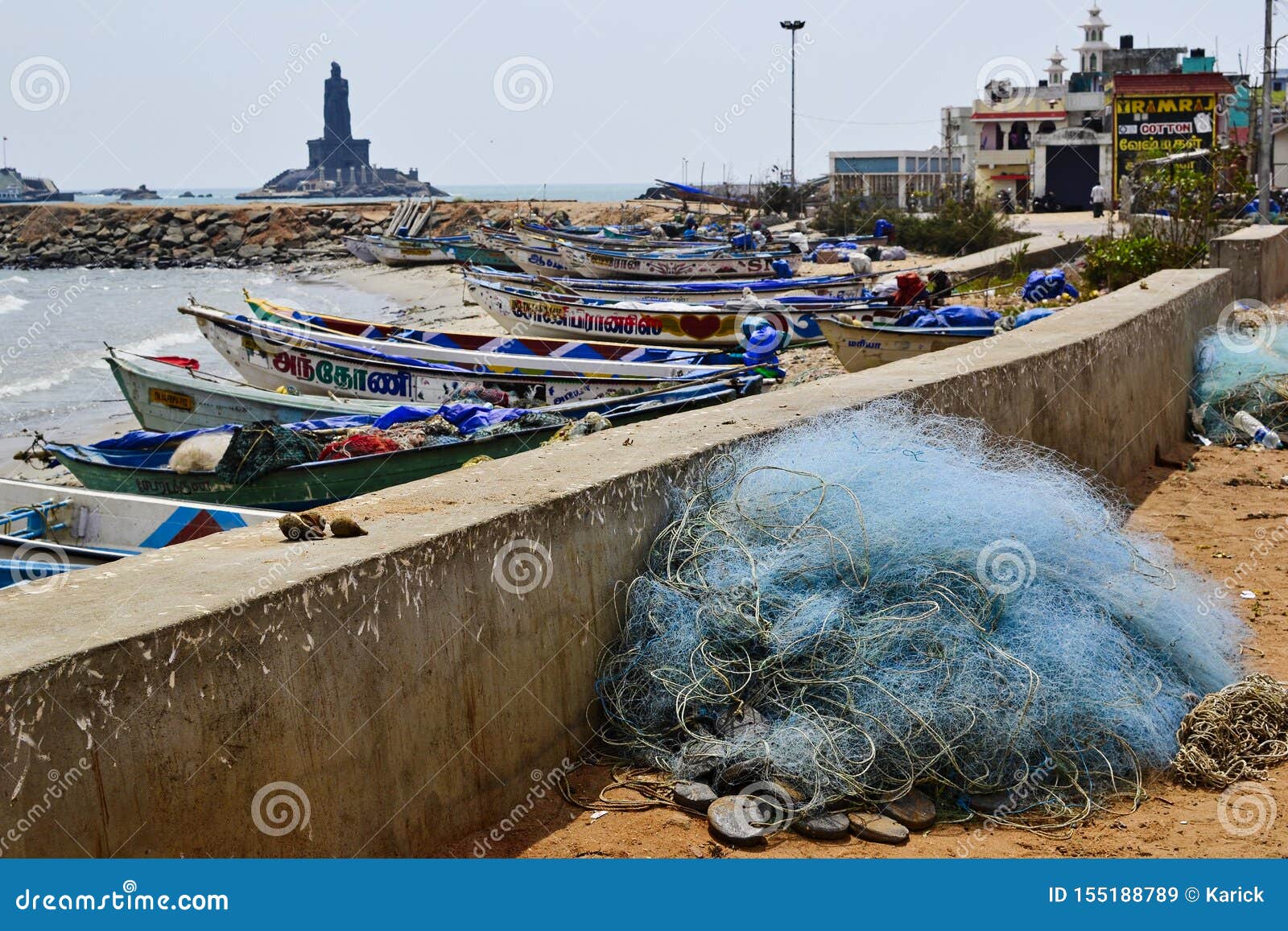 Fishermen Boats in a Small Harbour. Heap of Fishing Net Equipment on the  Beach Editorial Stock Image - Image of architecture, nature: 155188789