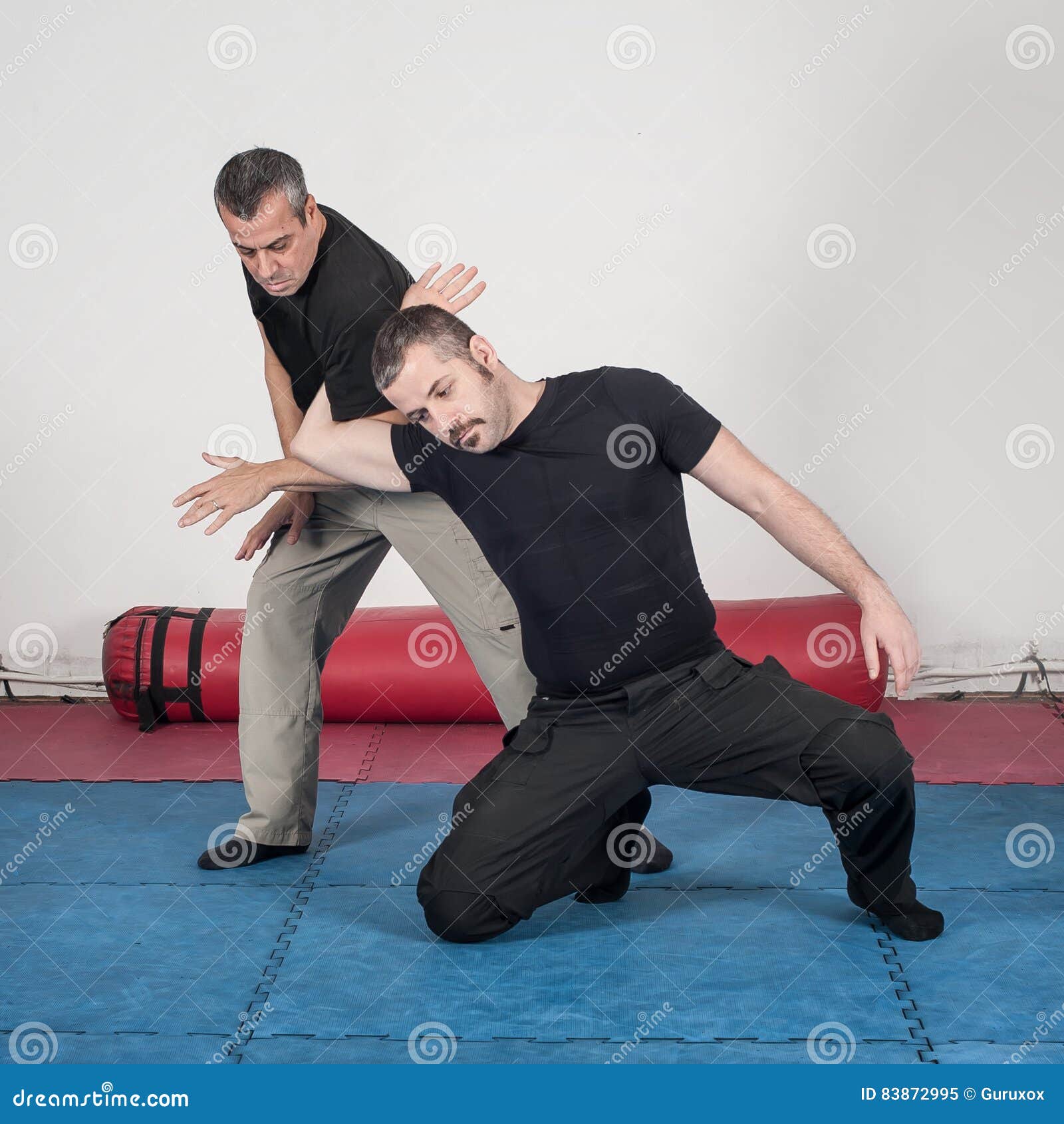 Escrima and kapap instructor demonstrates sticks fighting