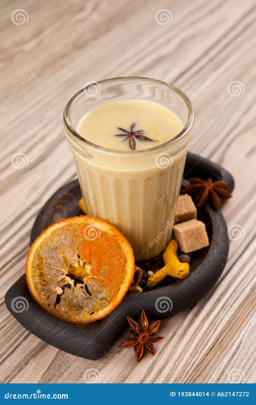 Karak Tea or Masala Chai. Popular Indian Drink in Glass on Wooden Table ...