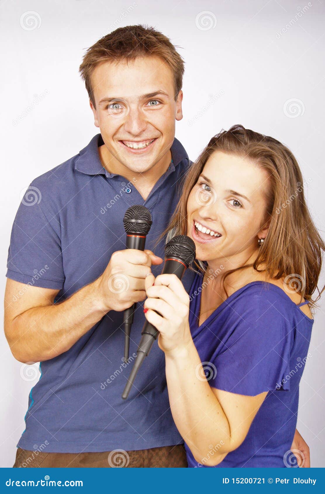 Karaoke with young couple stock image. Image of love 15200721