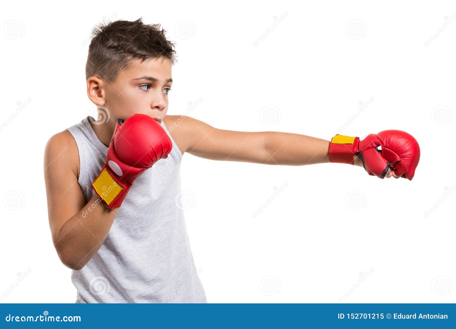 Karate Boy in Fighting Stance, Strikes with a Hand, on His Hands Red ...