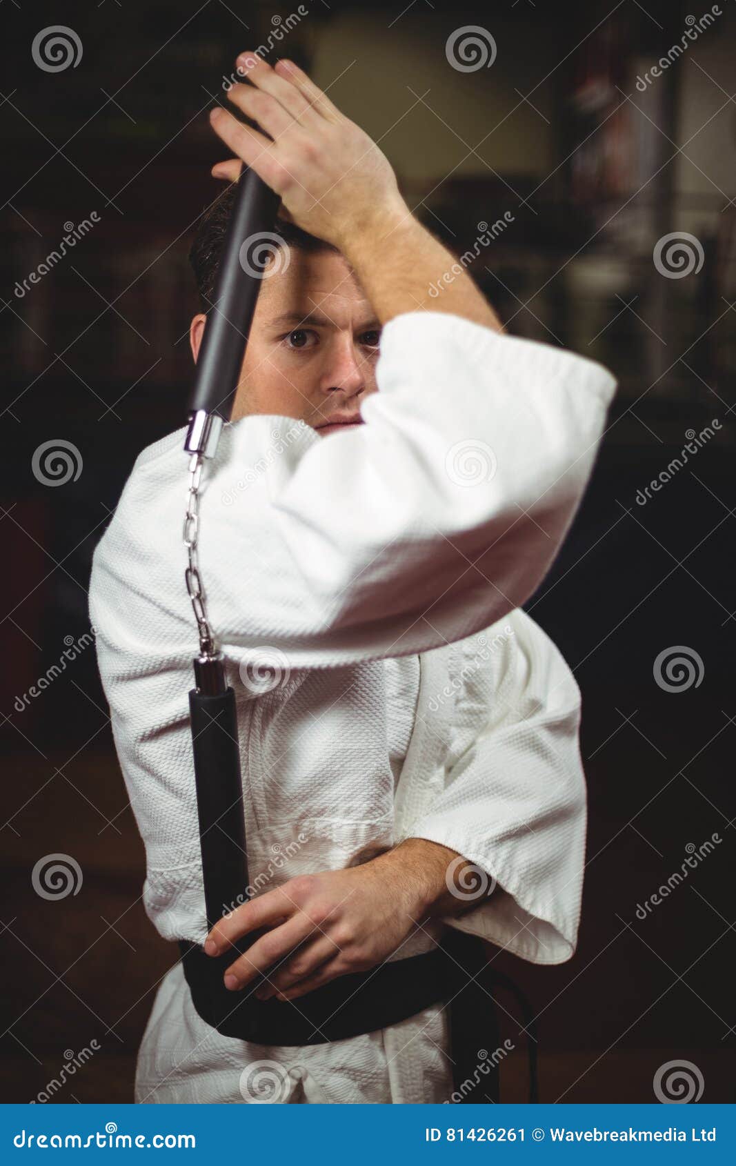 Karate Player Practicing with Nunchaku Stock Image Image of karategi