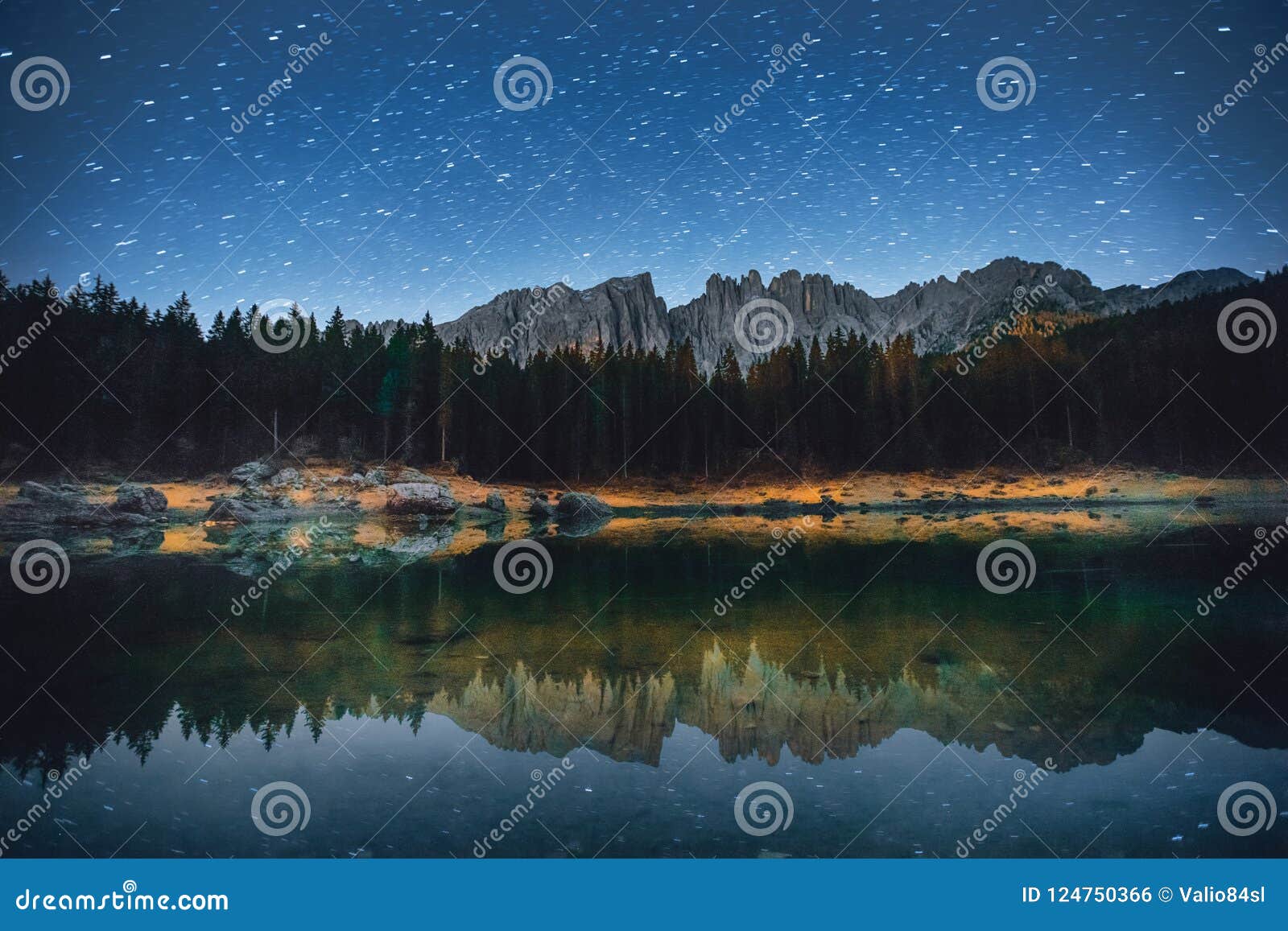 the karersee lake or lago di carezza with reflection of mountain