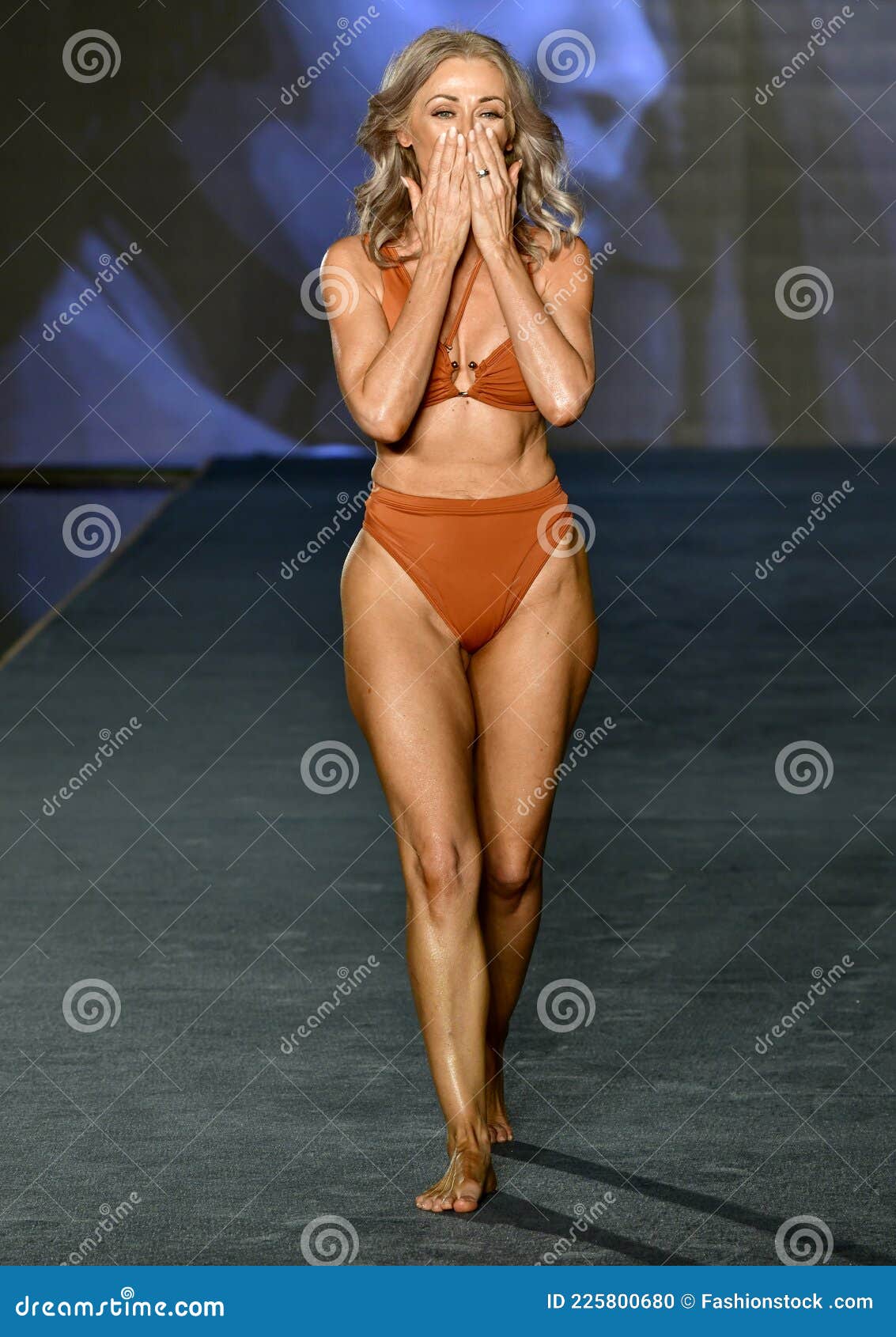 Kathy Jacobs Walks the Runway during the 2021 Sports Illustrated