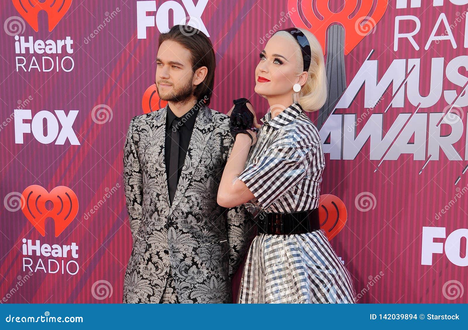Katy Perry and Zedd editorial stock image. Image of dress - 142039894