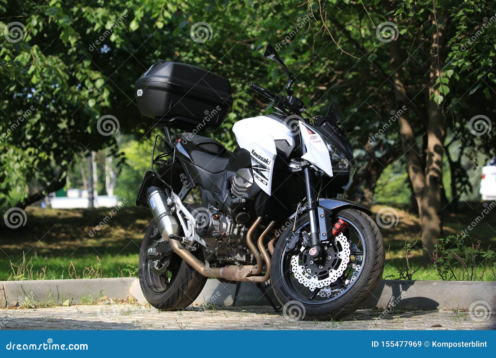 Kawasaki Z800 Motorcycle with Rear Case on a Sunny Day, on the Background of Green Bushes Editorial Stock - Image of region: 155477969