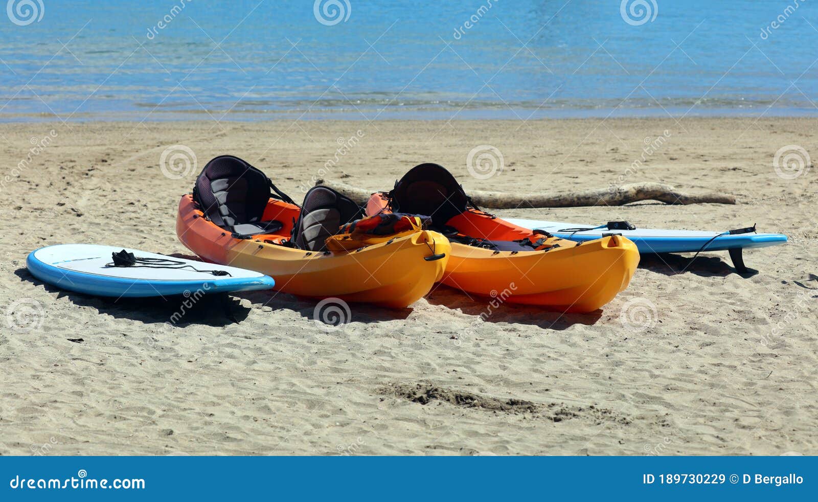 kayak and surf boards watersports at beach in costa rica