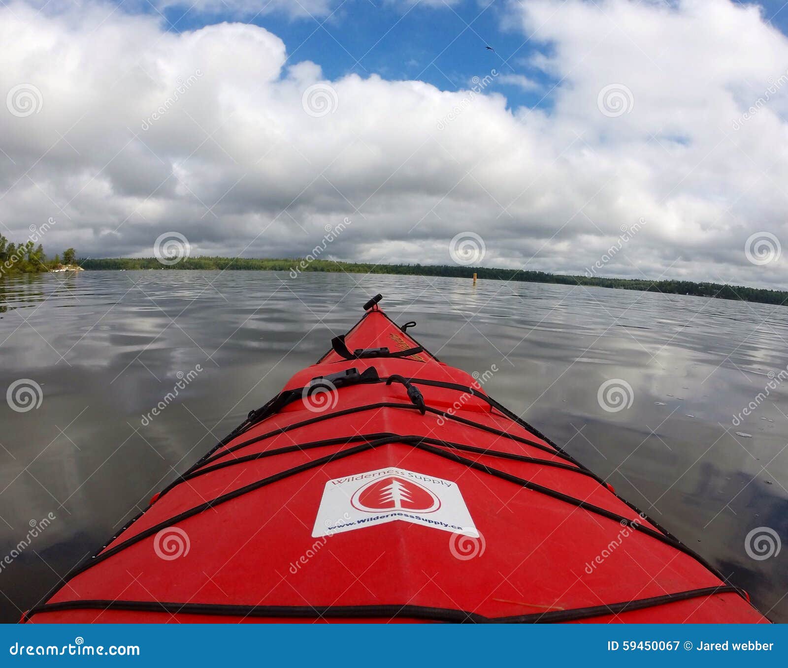 Kayak on the water editorial photography. Image of lake 59450067