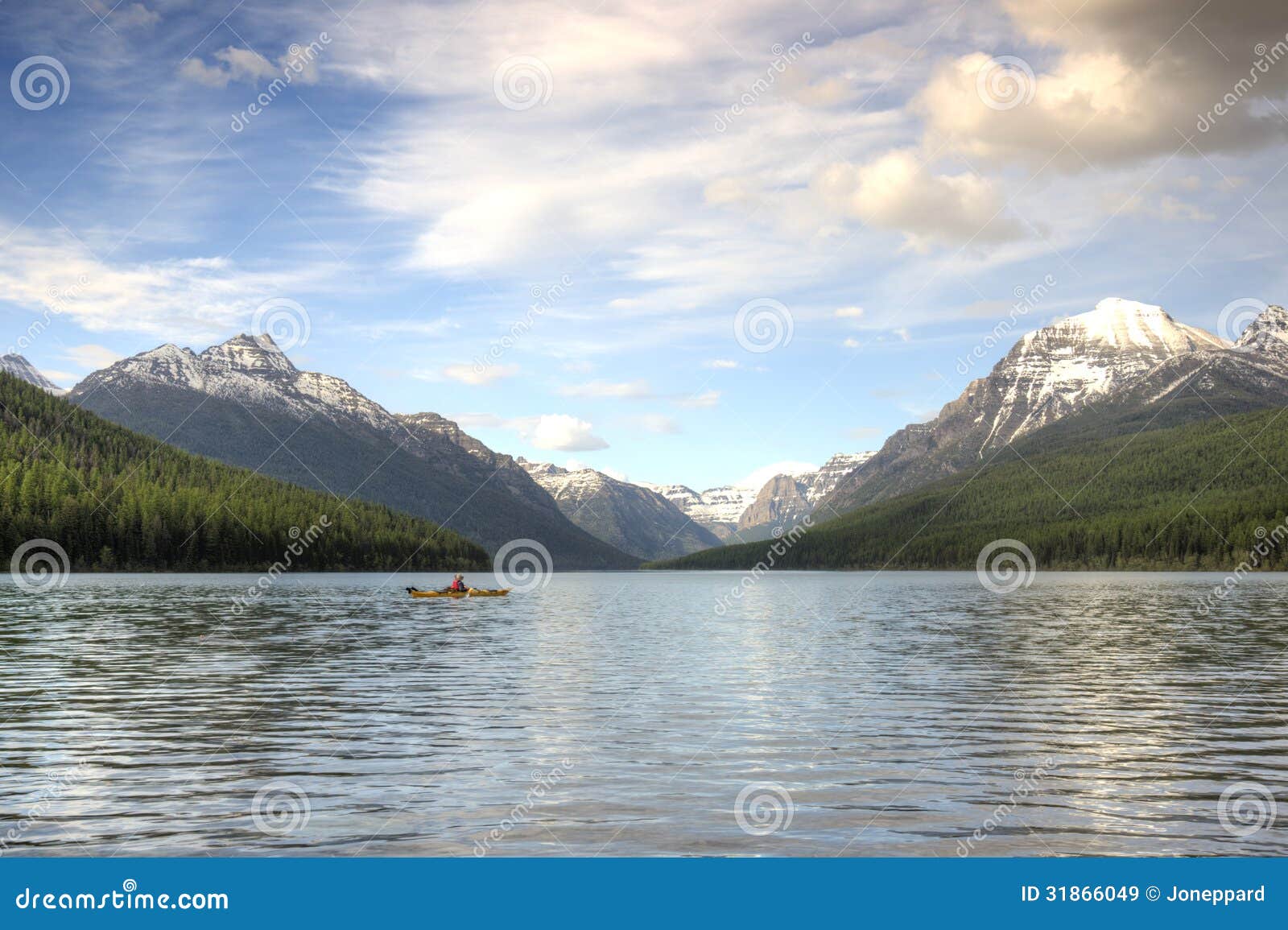 kayaker on bowman lake