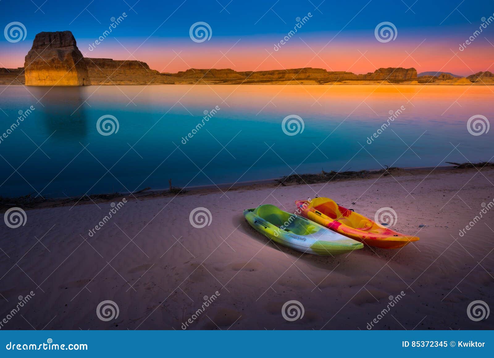 kayaking lake powell lone rock at sunset utah usa