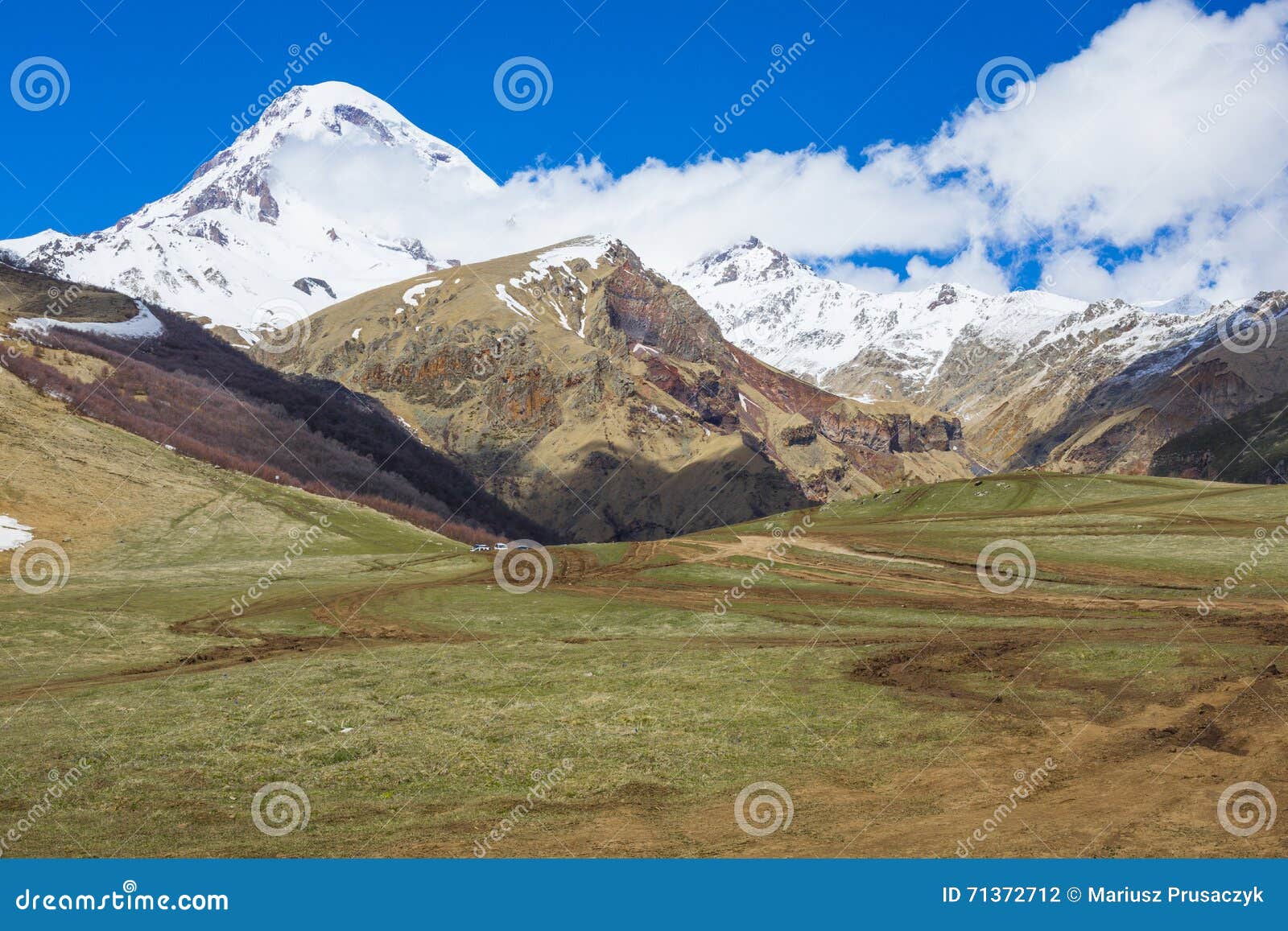 Kazbek Peak Mountains and Blue Sky. Stock Photo Image of