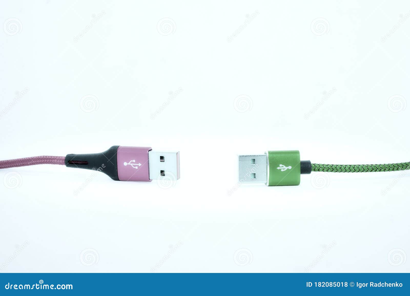 Keep Distance.Two USB Cable on the White Background. Stock Photo