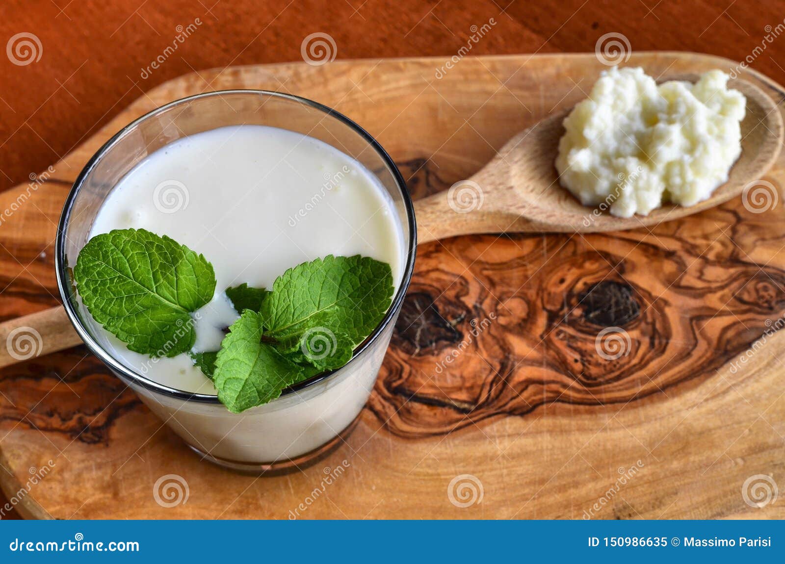 close-up shot on a full glass of white kefir