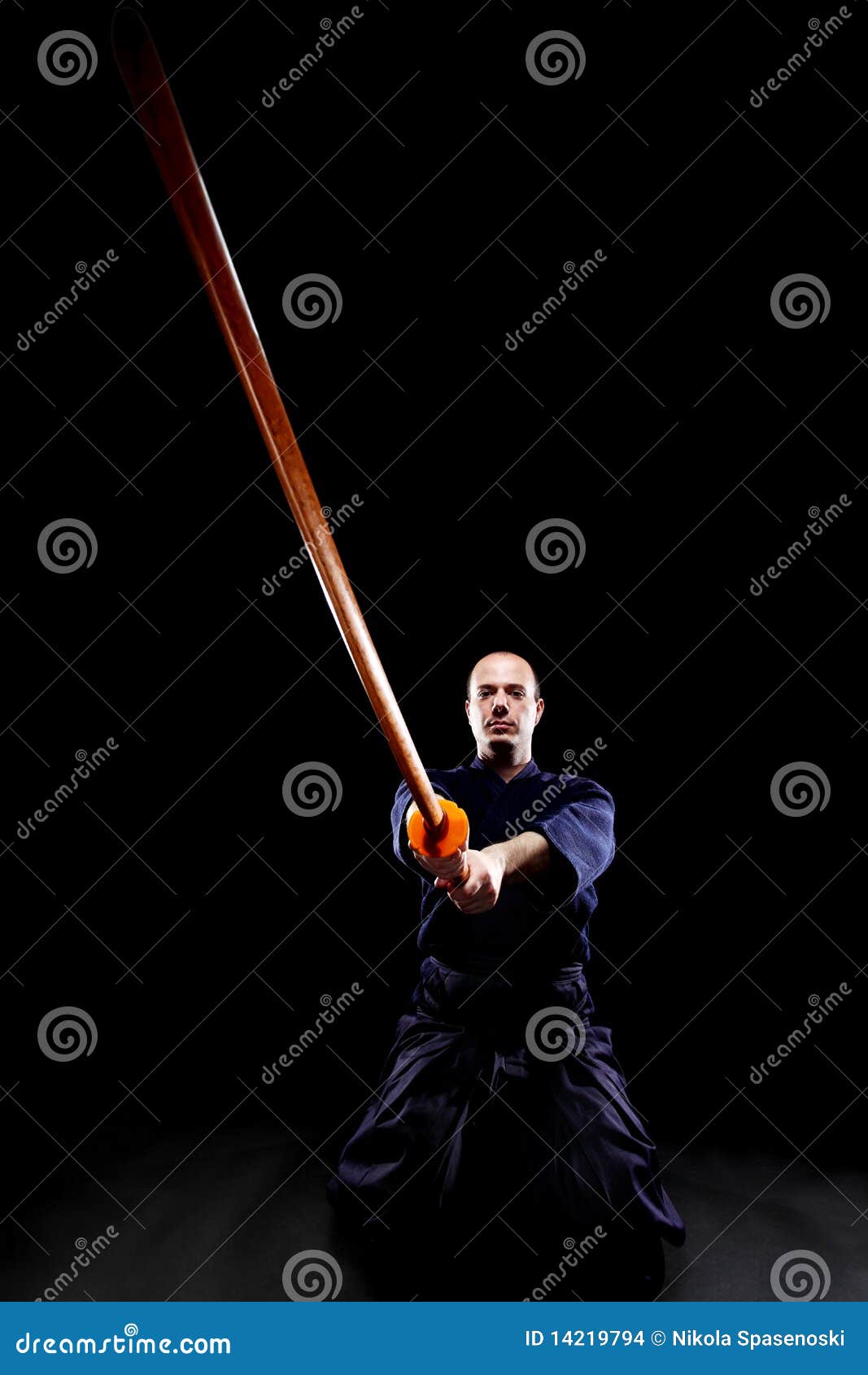 Kendo fighter with Bokken stock photo. Image of costume 14219794