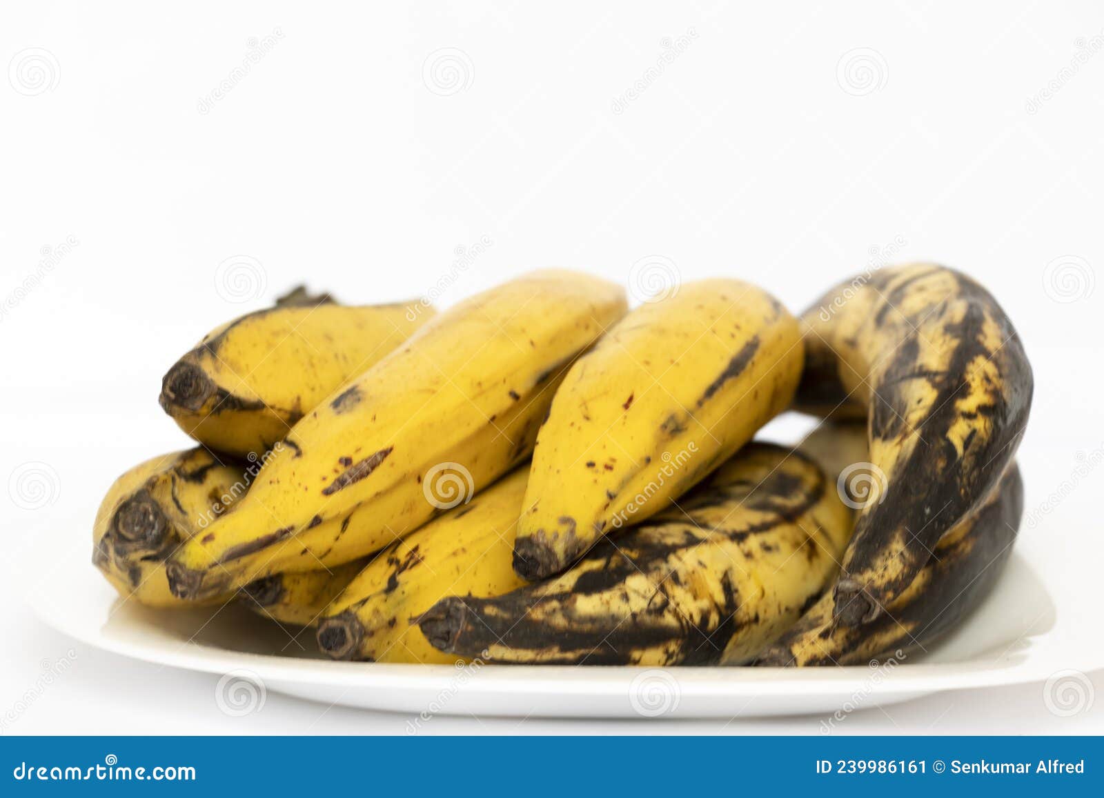 kerala ripen ethapazham or plantain banana in white plate. also known as nenthra pazham