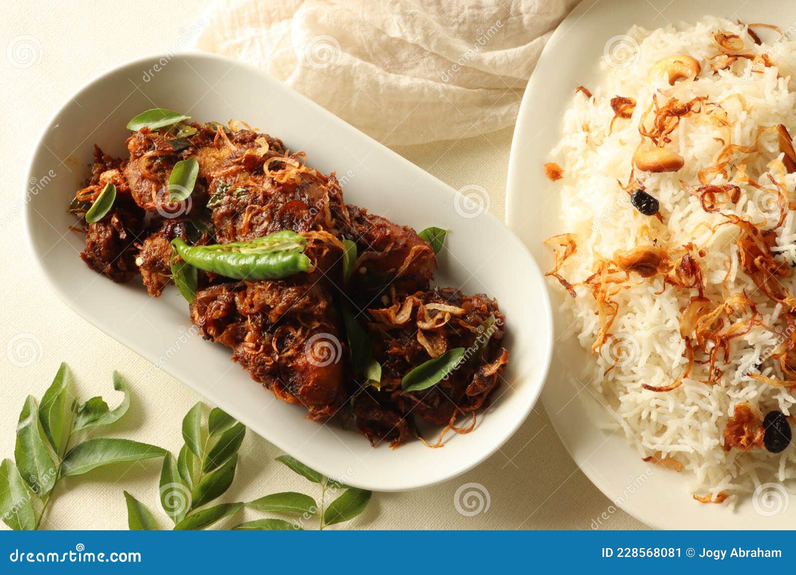 Kerala Style Spicy Chicken Roast Served With Ghee Rice Made Of Basmati
