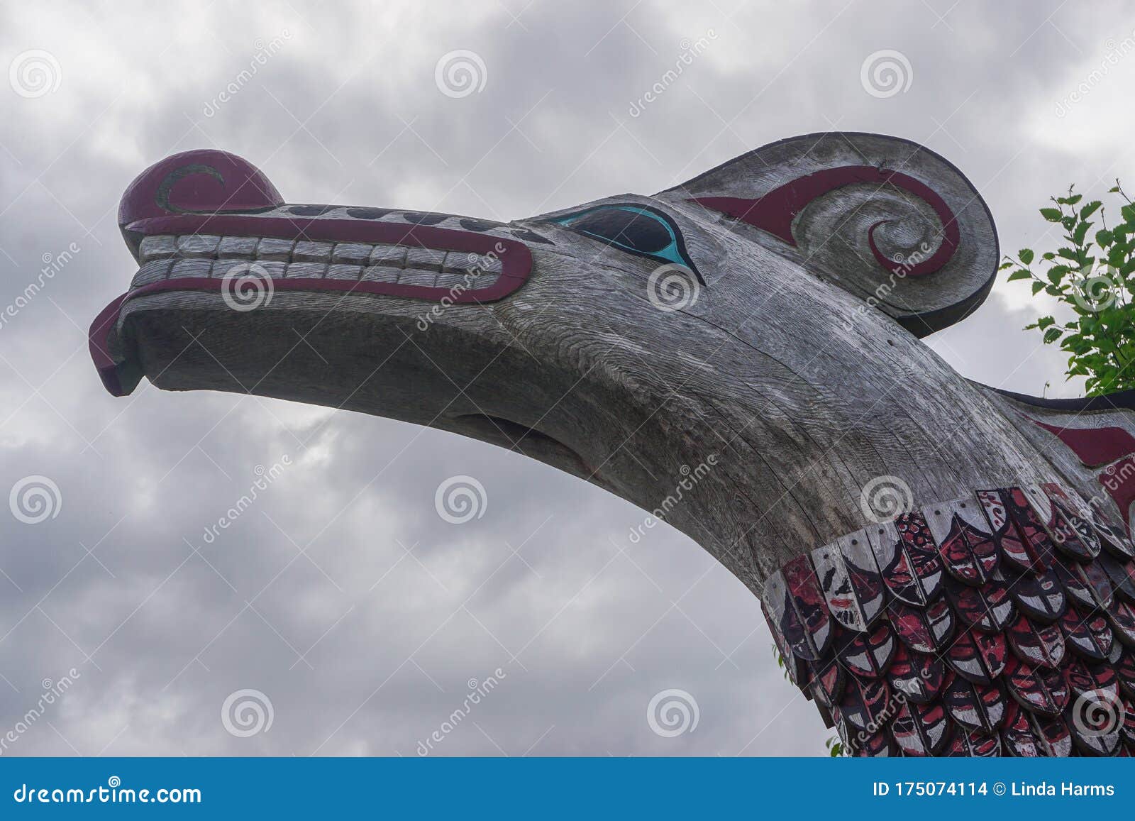 ketchikan, alaska: closeup of a totem on the grounds of potlatch totem park