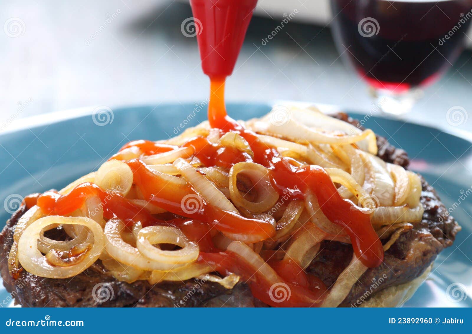 Ketchup on Steak Burger stock photo. Image of onions 23892960