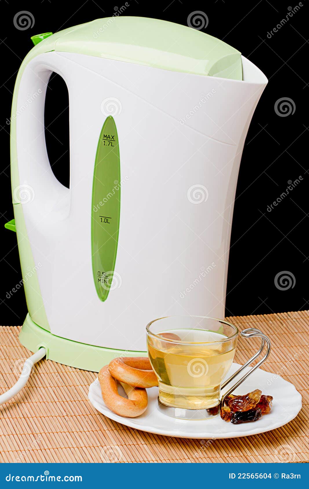 Kettle and a cup of tea stock photo. Image of kitchenware 22565604