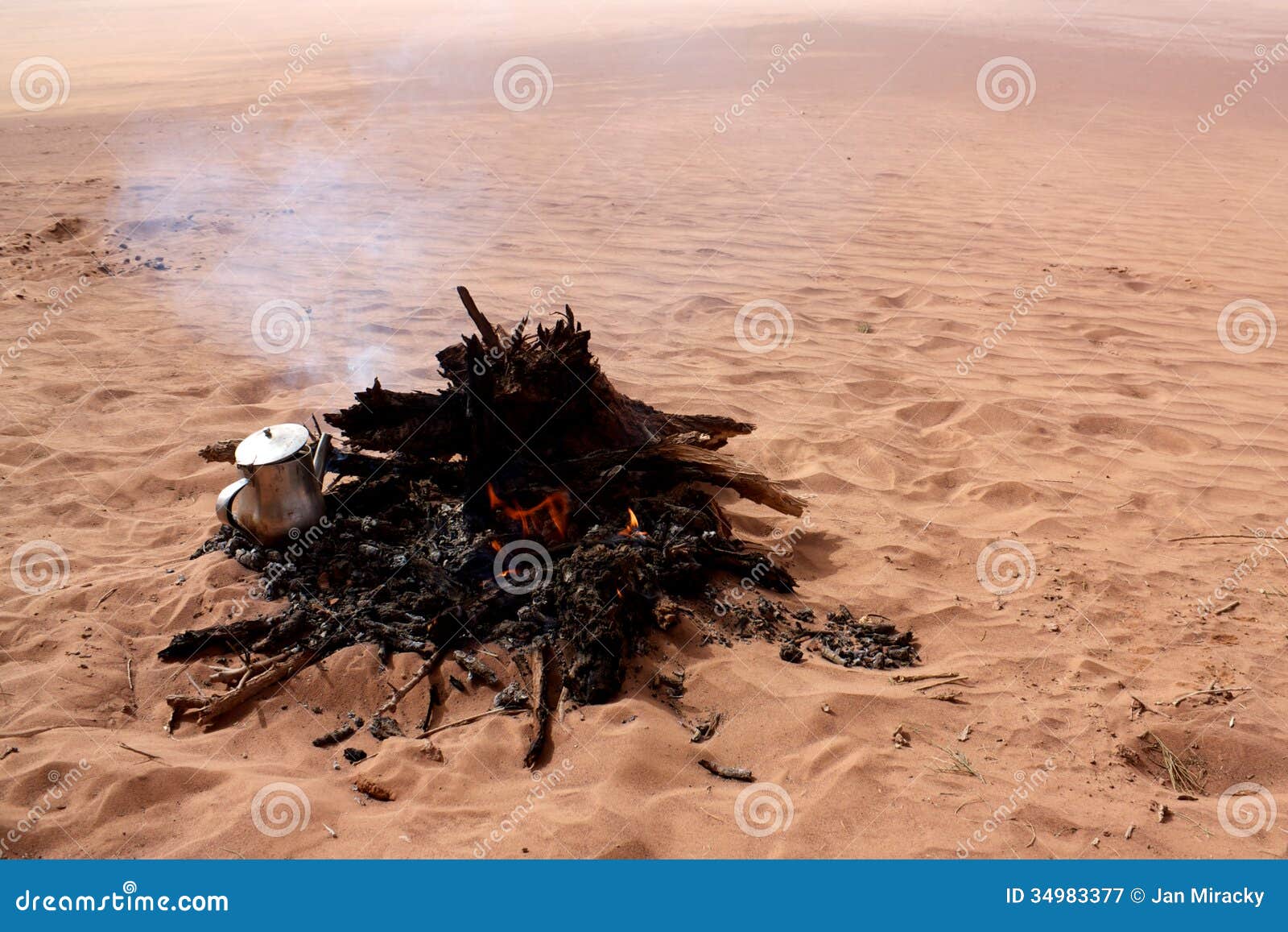 Kettle on fire in desert stock image. Image of water 34983377