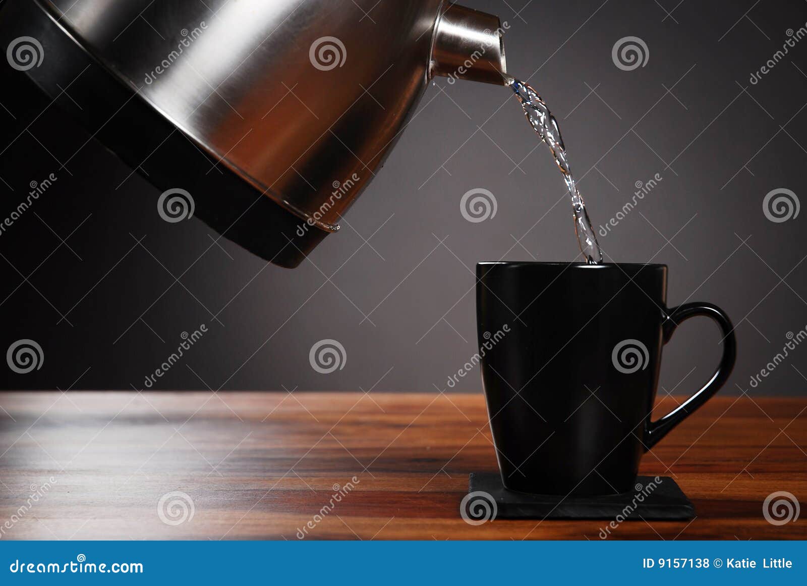 Kettle pouring into mug stock photo. Image of kettle, refreshment 9157138