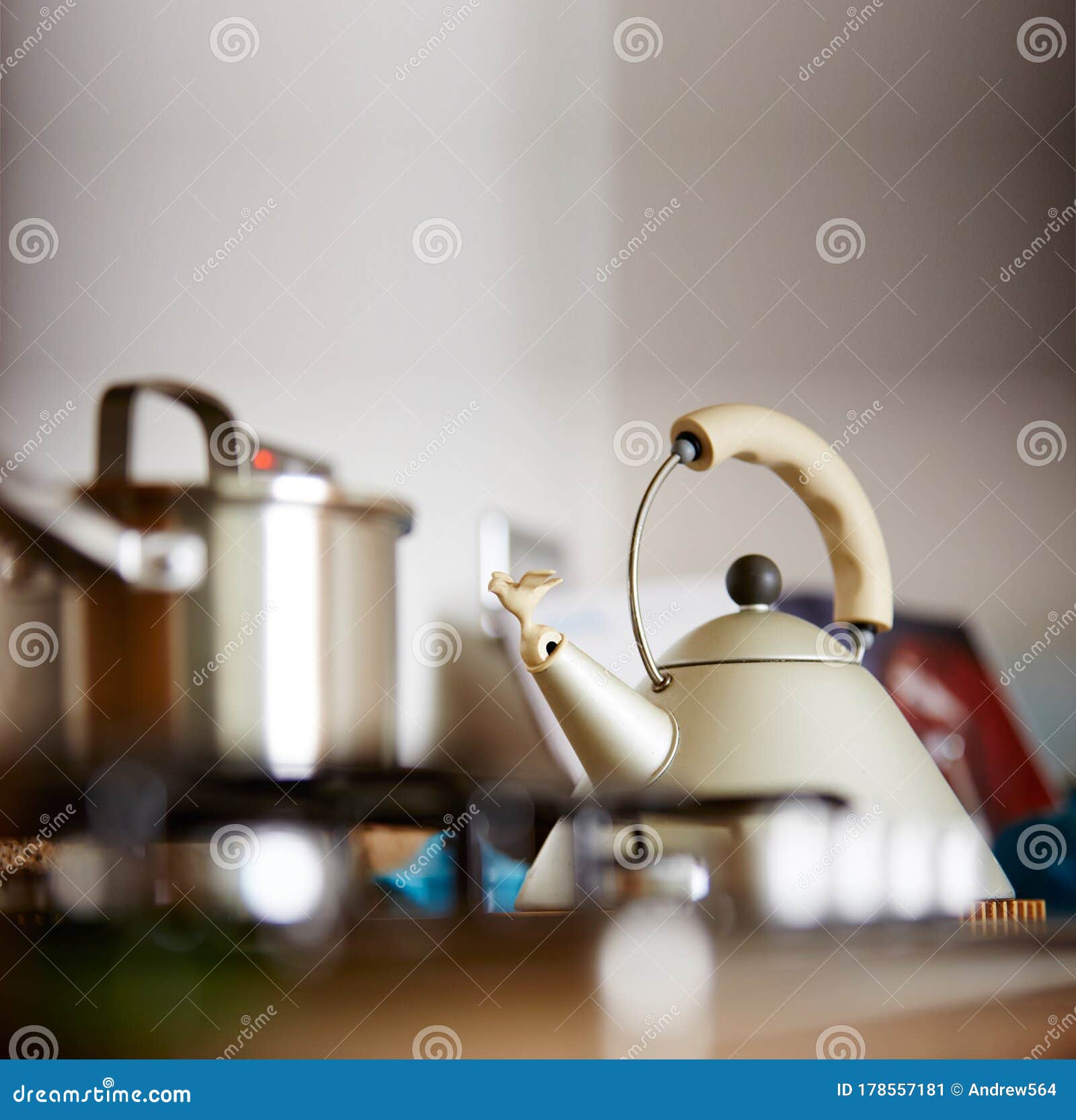 Kettle on stove in kitchen stock image. Image of drink 178557181