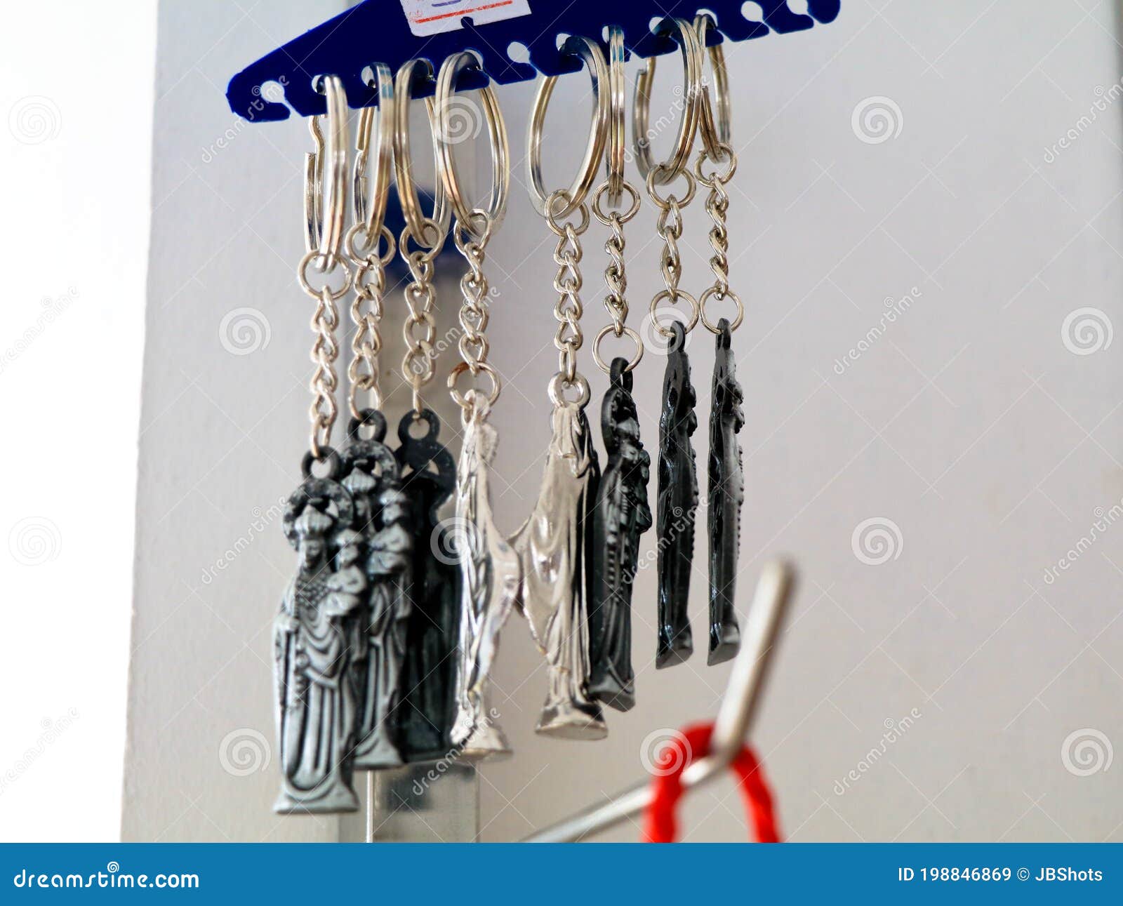 Key Chains with Catholic Religious Symbols in a Pious Articles Shop