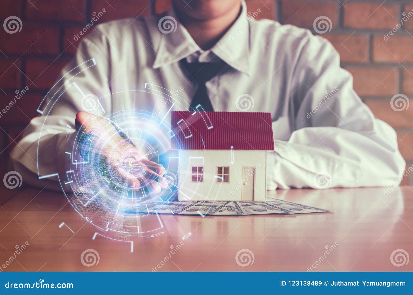 key in hand and new house, indicative of success and commitment with data technology business concept.