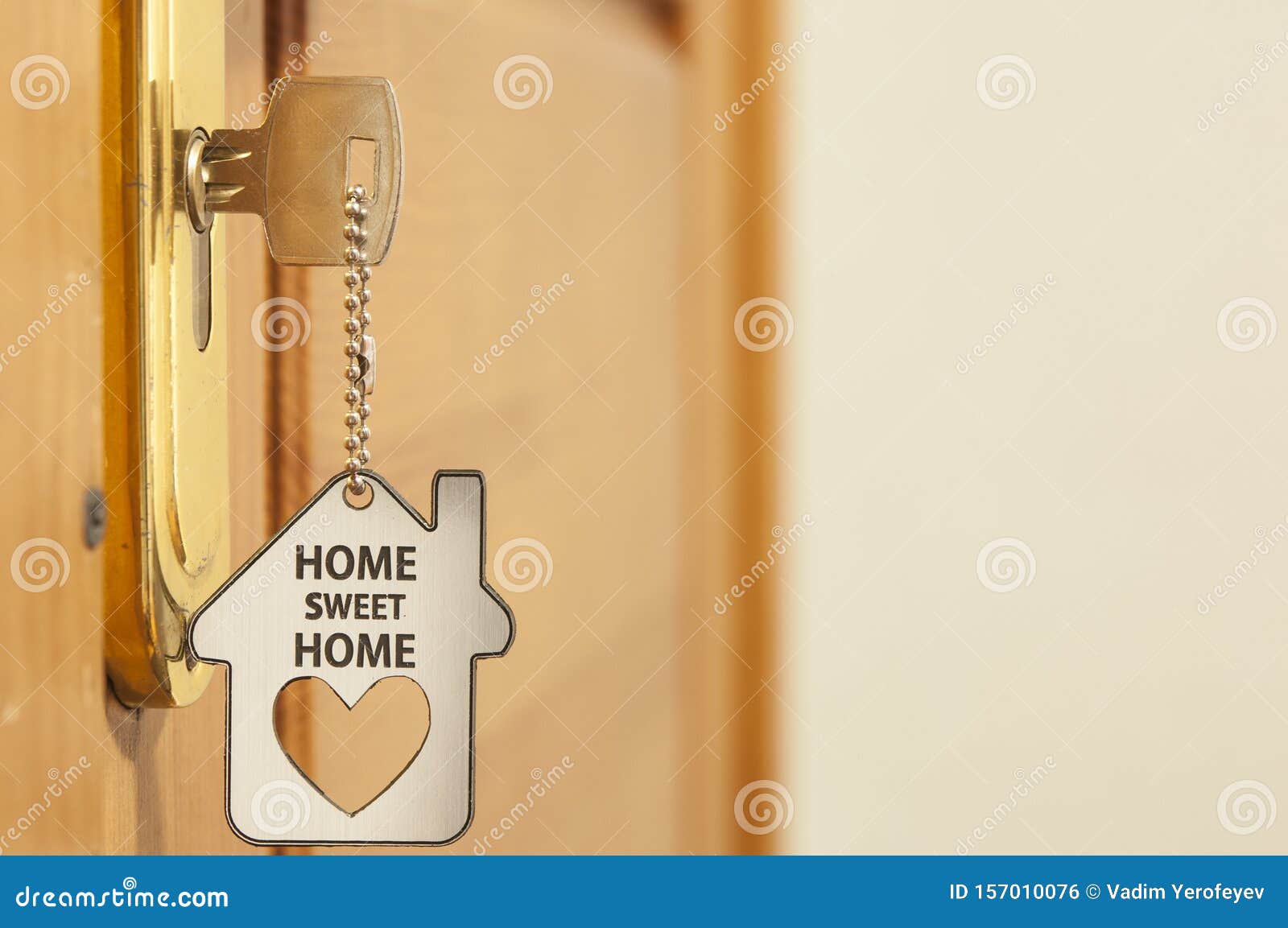 A Key in a Lock with House Icon on it Stock Photo Image of building