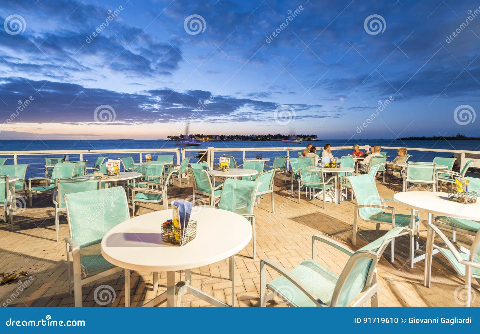 KEY WEST, FL - JANUARY 2016: Tourists at Restaurant Along the Ocean