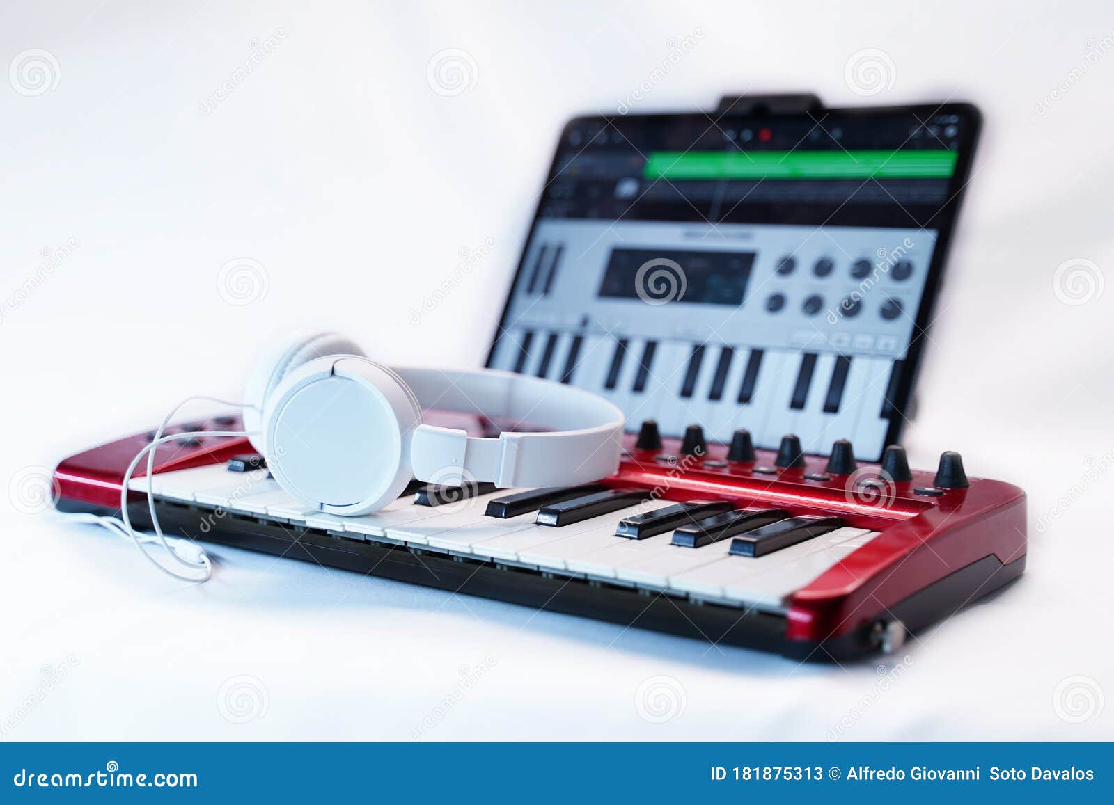Red Midi Keyboard with Headphones for Music Production Stock Image