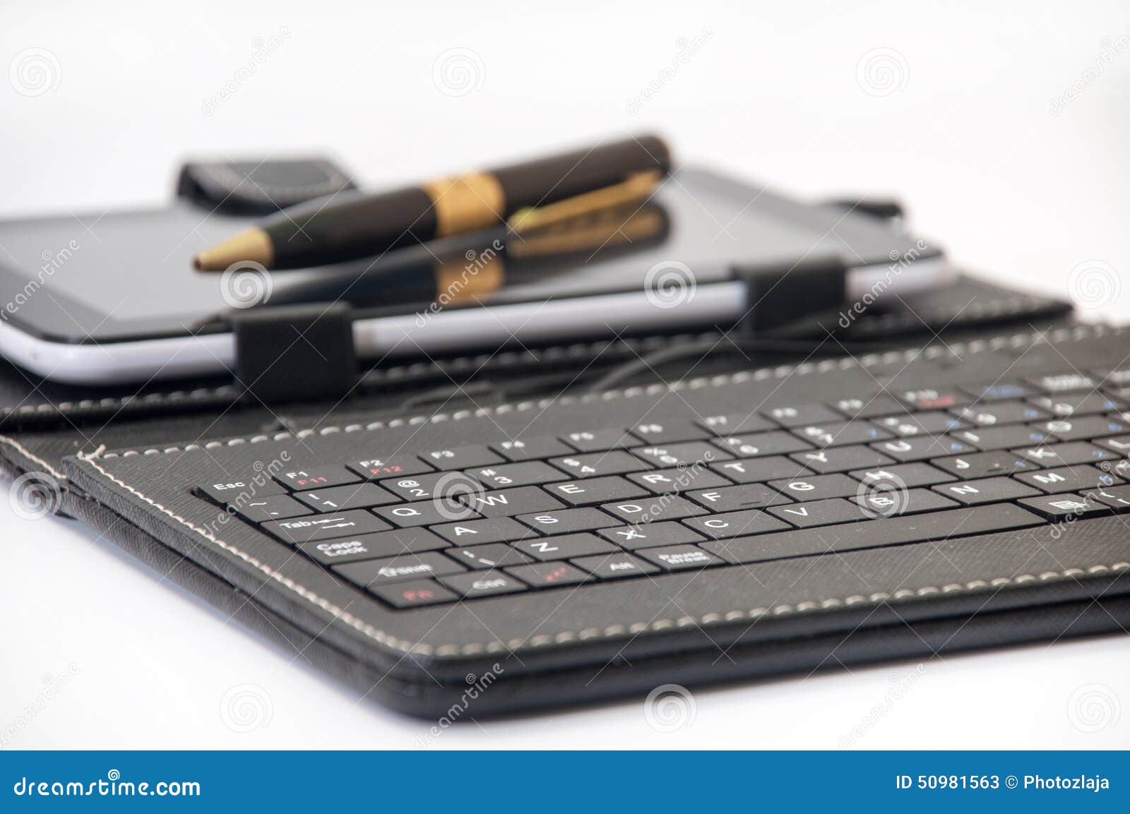Keyboard for Android in Focus and the Tablet Background Stock Image - Image  of finance, device: 50981563