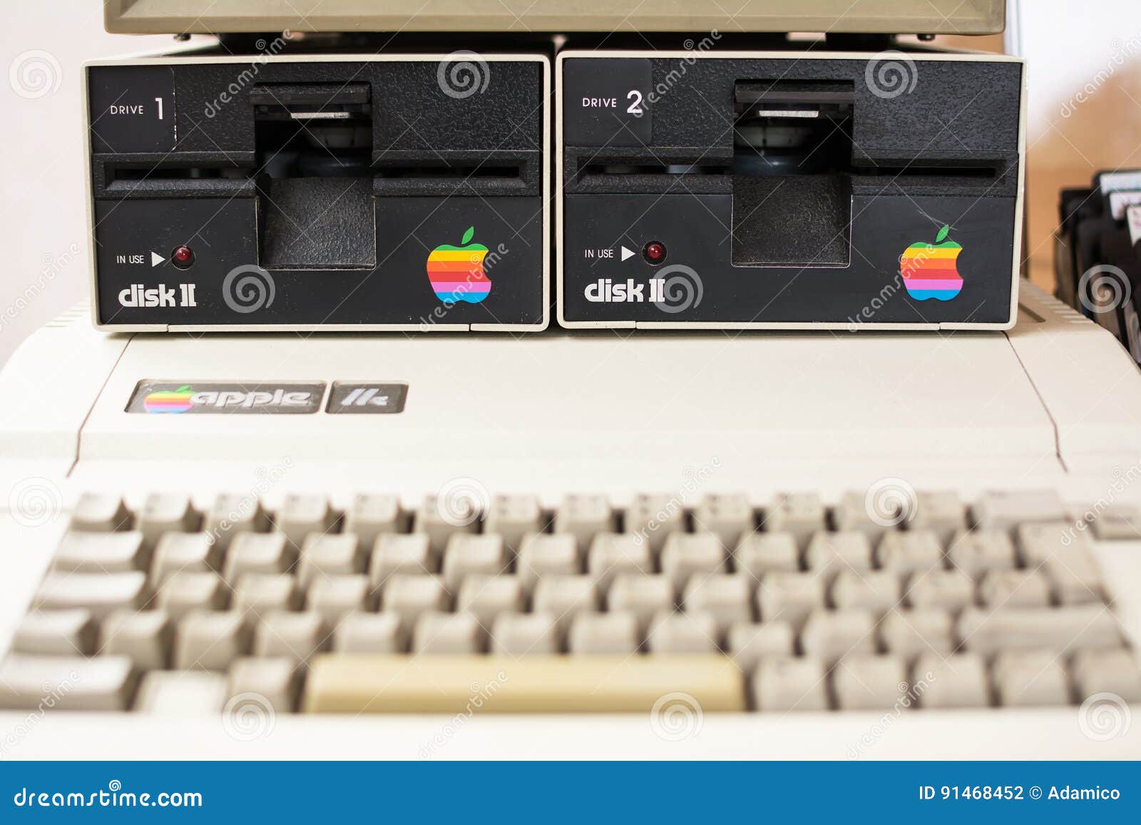 Keyboard blurred and disk drive of Aged II Apple computer