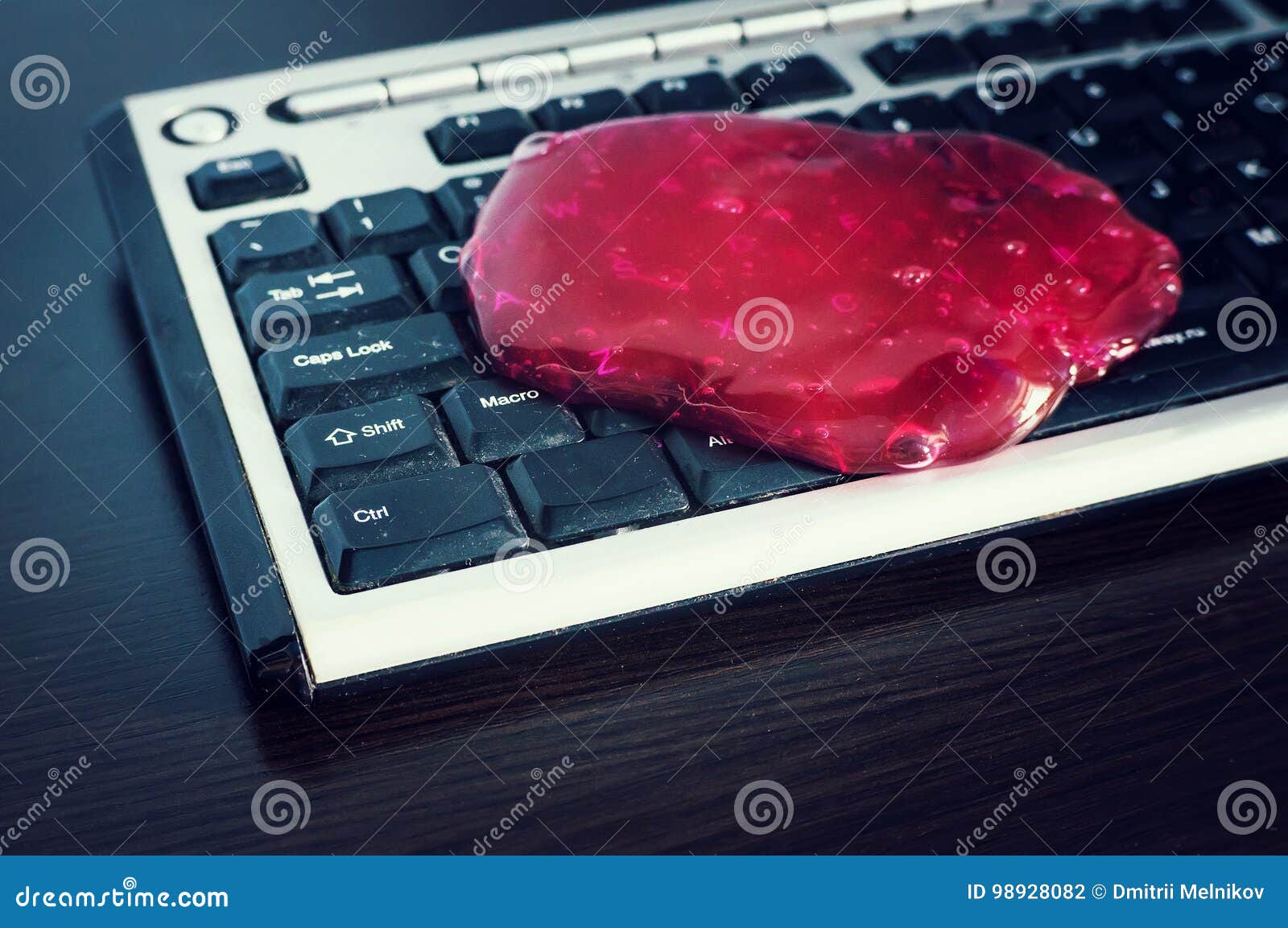 Keyboard Cleaning Gel is Laying on the Notebook. Stock Photo Image of